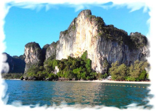 Cliff, separating beaches Tonsai and Railay West . View from the sea.