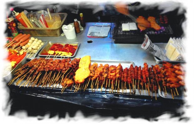 Mobile hawker stalls with bbq - an opportunity to buy meat dishes cheaply